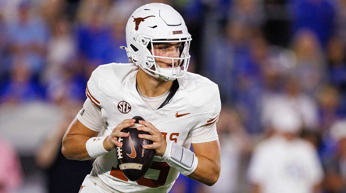 Texas Longhorns quarterback Arch Manning (16) looks for an open receiver during the first quarter against the Kentucky Wildcats at Kroger Field.