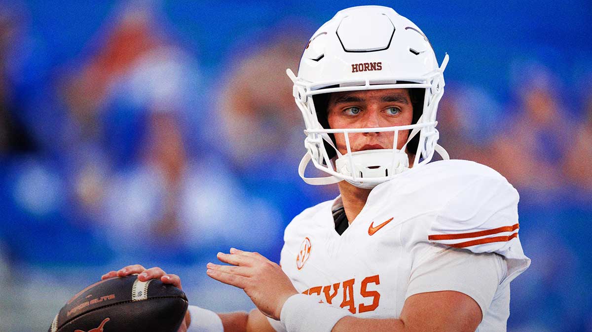 Texas Longhorns quarterback Arch Manning (16) warms up before the game against the Kentucky Wildcats at Kroger Field.