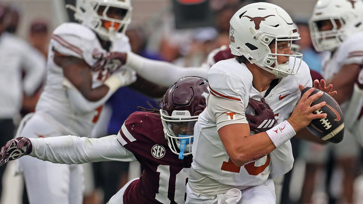 Mississippi State Bulldogs linebacker Derion Gullette (16) sacks Texas Longhorns quarterback Arch Manning (16) during the first quarter at Davis Wade Stadium at Scott Field.