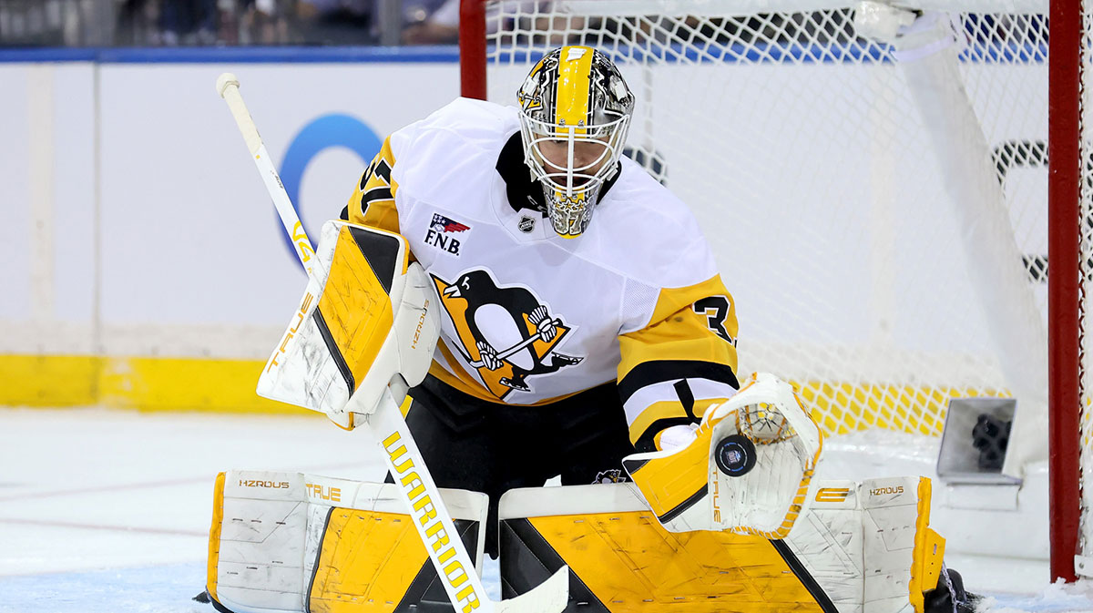 Pittsburgh Penguins goaltender Arturs Silovs (37) makes a save against the New York Rangers during the first period at Madison Square Garden.