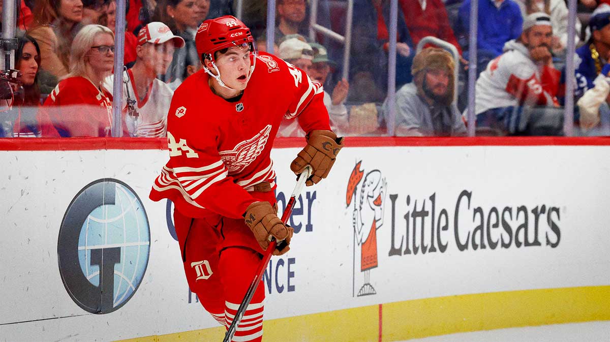 Detroit Red Wings defenseman Axel Sandin-Pellikka (44) skates with the puck in the first period against the Toronto Maple Leafs at Little Caesars Arena.