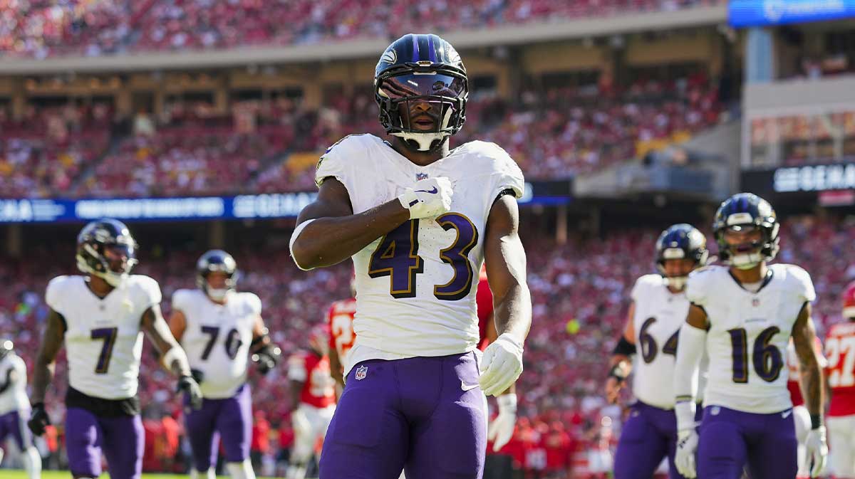 Baltimore Ravens running back Justice Hill (43) celebrates after scoring a touchdown