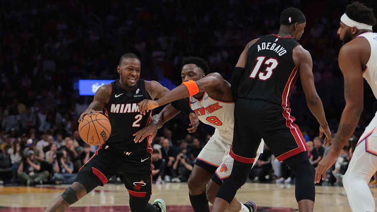 Miami Heat guard Terry Rozier (2) drives to the basket past New York Knicks forward OG Anunoby (8) during the fourth quarter at Kaseya Center.