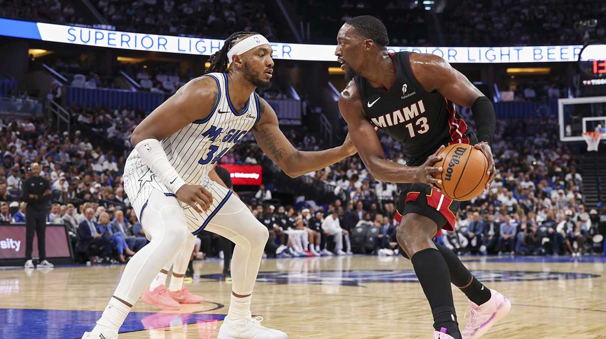 Miami Heat center Bam Adebayo (13) is guarded by Orlando Magic center Wendell Carter Jr. (34) in the second quarter at Kia Center.