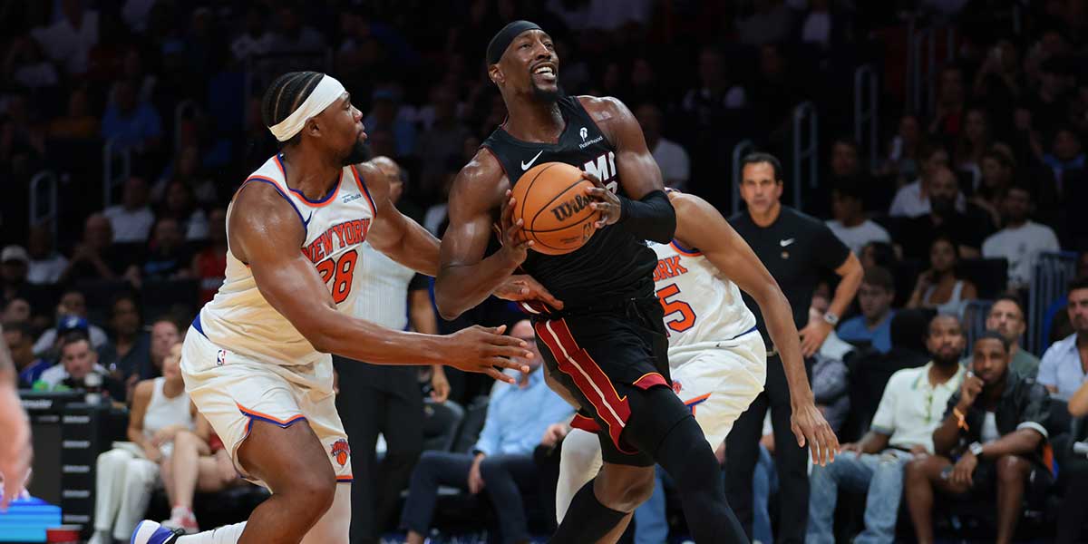 Miami Heat center Bam Adebayo (13) drives to the basket against New York Knicks forward Guerschon Yabusele (28) during the second quarter at Kaseya Center.