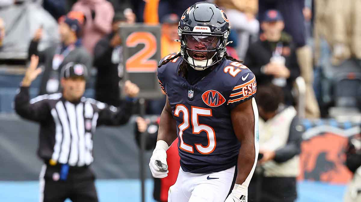 Chicago Bears running back Kyle Monangai (25) reacts after rushing for a touchdown against the New Orleans Saints during the second quarter at Soldier Field.