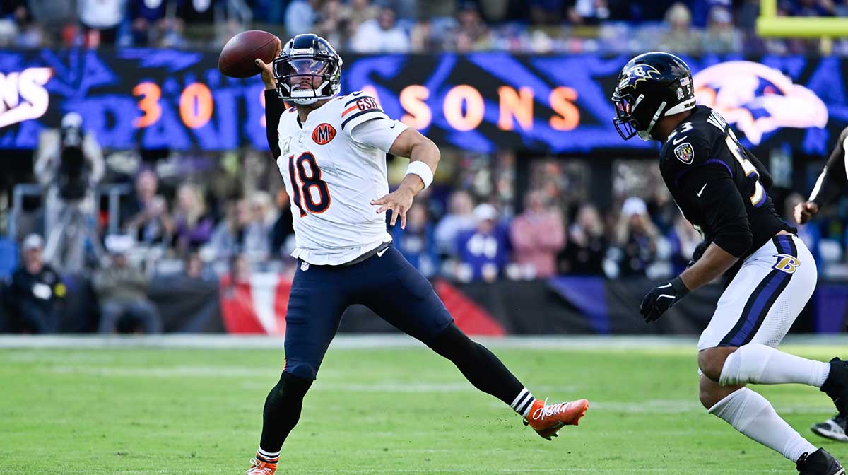 Chicago Bears quarterback Caleb Williams (18) throws a pass as Baltimore Ravens linebacker Kyle Van Noy (53) defends during the fourth quarter at M&T Bank Stadium.