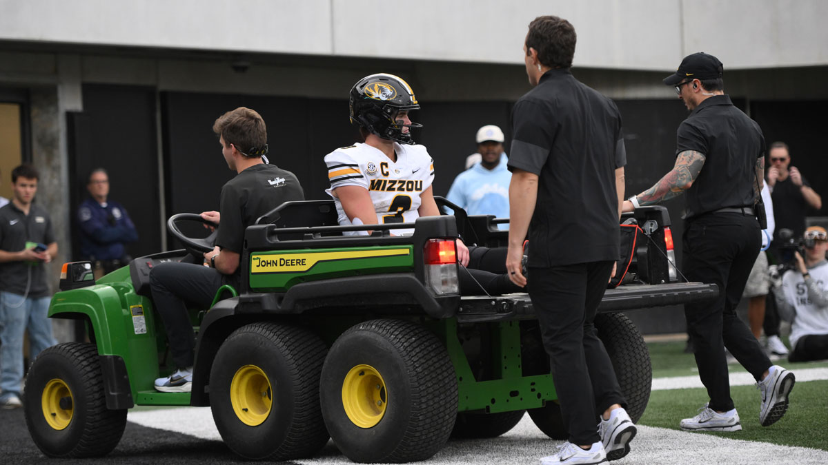 Missouri Tigers quarterback Beau Pribula (9) is carted from the field by medical personnel after he was injured on a fourth down run against the Vanderbilt Commodores during the third quarter at FirstBank Stadium.