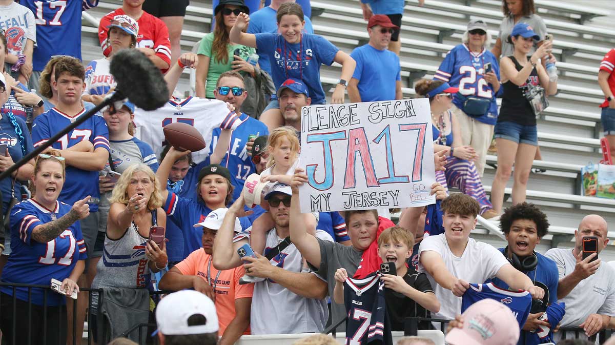 Fans do their best to score an autograph from Bills quarterback Josh Allen as the players leave the field during day three of Buffalo Bills training camp at St. John Fisher University Friday, July 25, 2025 in Pittsford, NY.