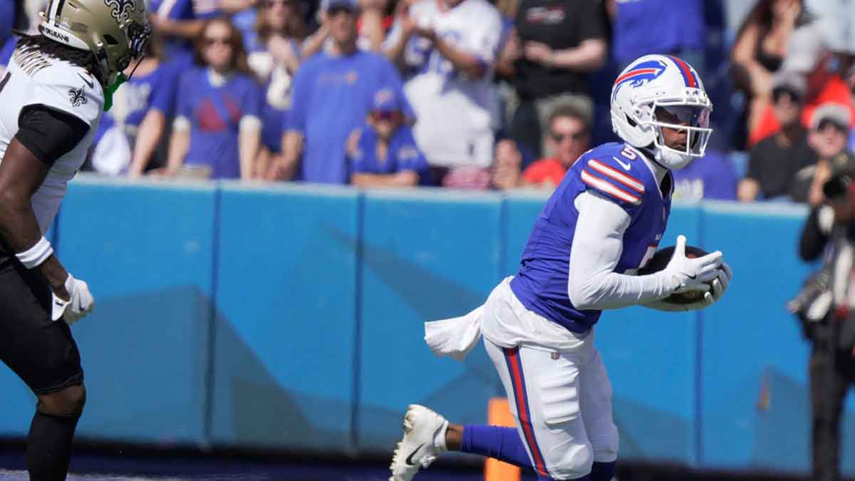 Buffalo Bills wide receiver Josh Palmer runs for several yards after catching a pass during first half action of the Bills home game against the New Orleans Saints.