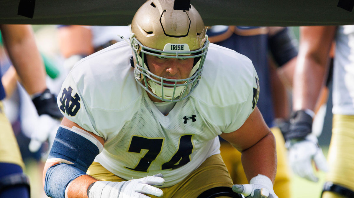 Notre Dame offensive lineman Billy Schrauth participates in a drill during a Notre Dame football practice at Irish Athletic Center.