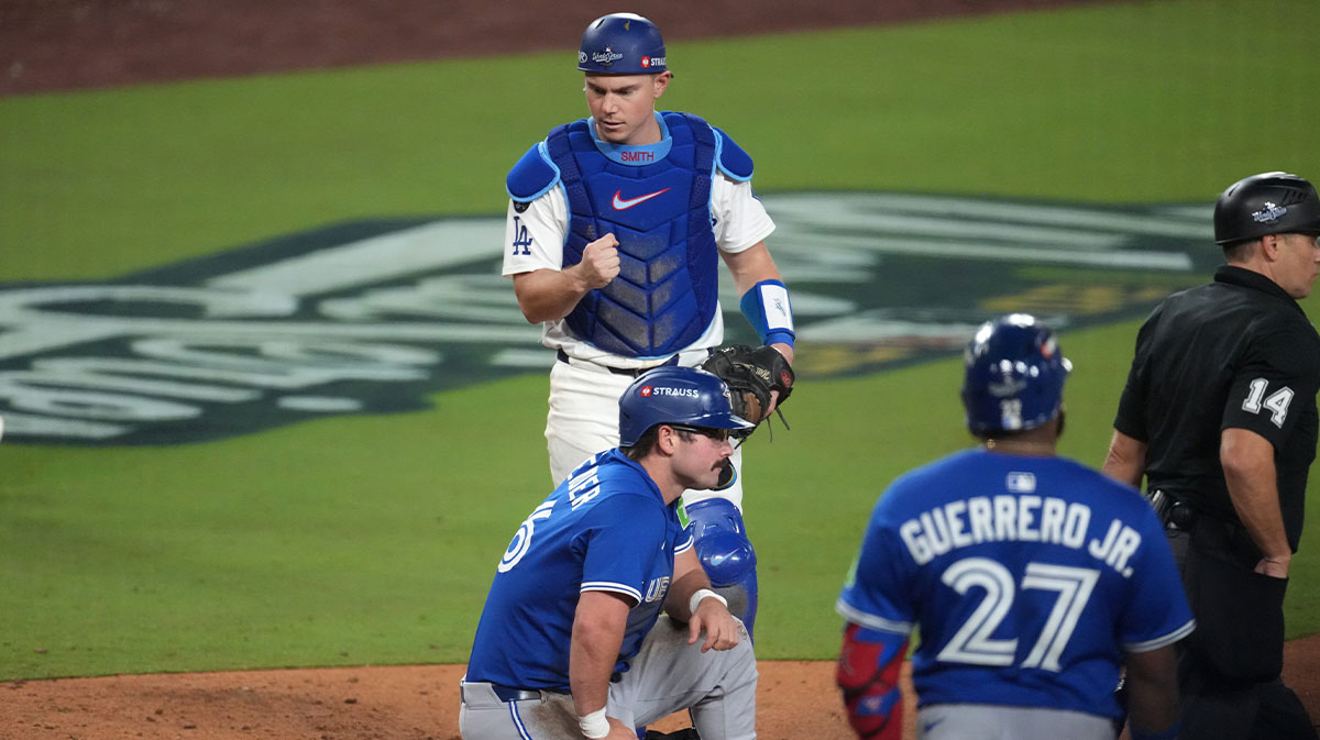 Blue Jays left fielder Davis Schneider (36) is out at home