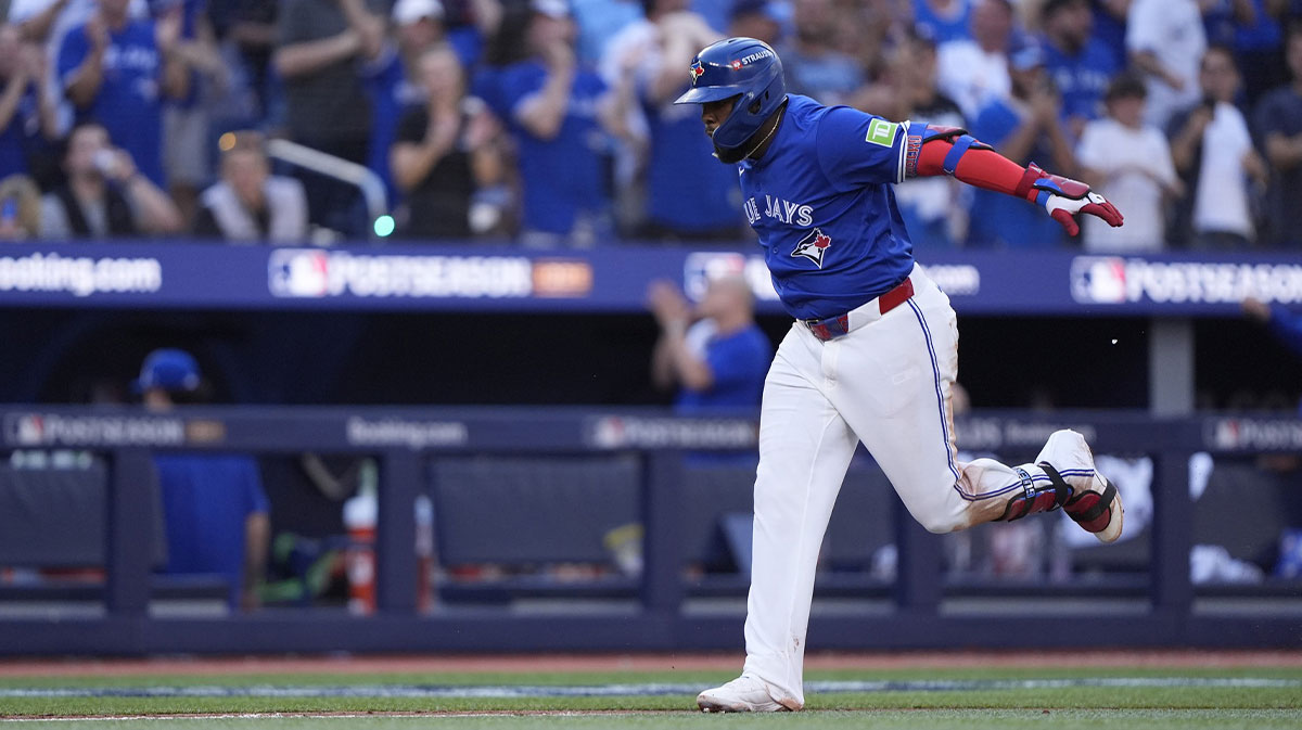 Toronto Blue Jays first baseman Vladimir Guerrero Jr. (27) celebrates after a grand slam in the fourth inning against the New York Yankees during game two of the ALDS round for the 2025 MLB playoffs at Rogers Centre.