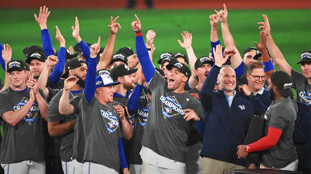Toronto Blue Jays celebrate after winning game seven of the ALCS round for the 2025 MLB playoffs against the Seattle Mariners at Rogers Centre.
