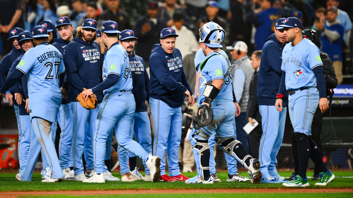 https://wp.clutchpoints.com/wp-content/uploads/2025/10/Blue-Jays-on-mound-celebrating.jpg