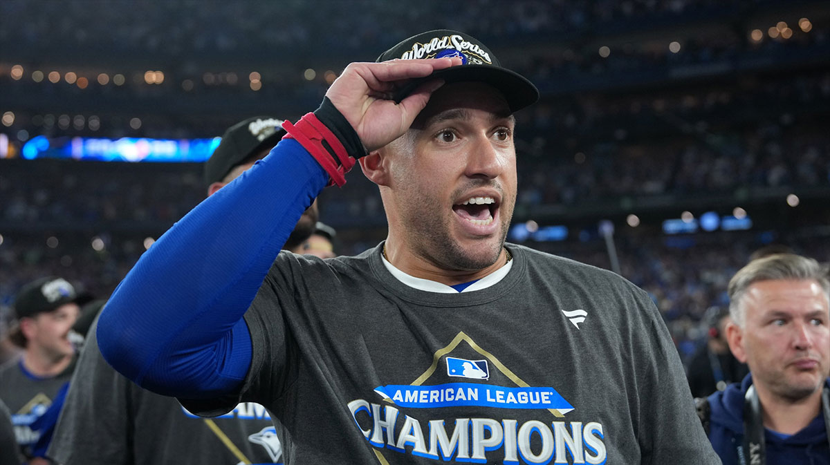 Toronto Blue Jays right fielder George Springer (4) celebrates after defeating the Seattle Mariners in game seven of the ALCS round for the 2025 MLB playoffs at Rogers Centre.
