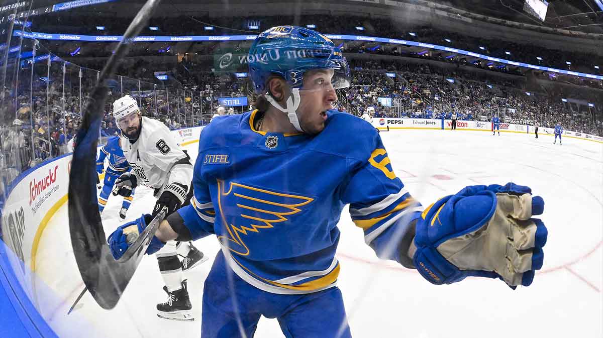 St. Louis Blues left wing Jake Neighbours (63) skates against Los Angeles Kings defenseman Drew Doughty (8) during the second period at Enterprise Center.