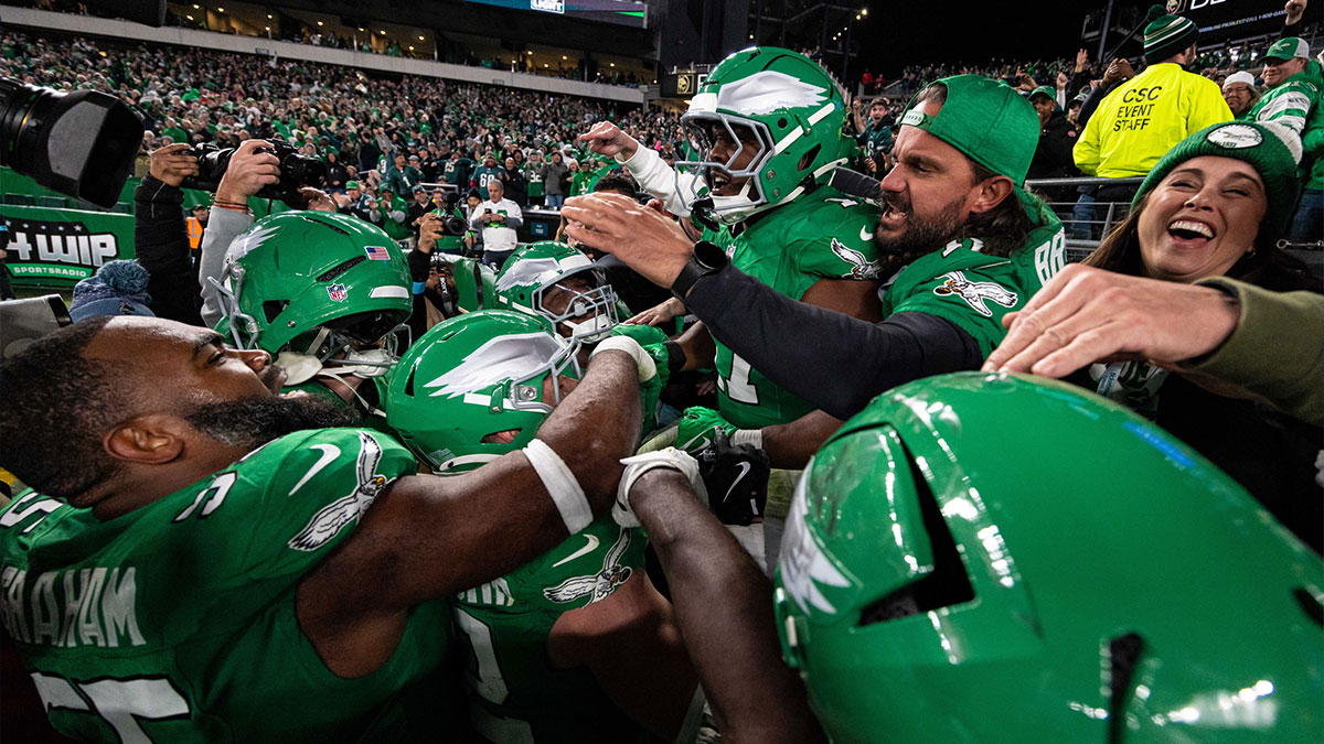 Philadelphia Eagles linebacker Nakobe Dean (17) celebrates with teammates and fans after an interception late in the fourth quarter against the Jacksonville Jaguars at Lincoln Financial Field.