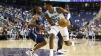 Charlotte Hornets forward Brandon Miller (24) is guarded by Memphis Grizzlies guard Javon Small (10) during second quarter action at First Horizon Coliseum.