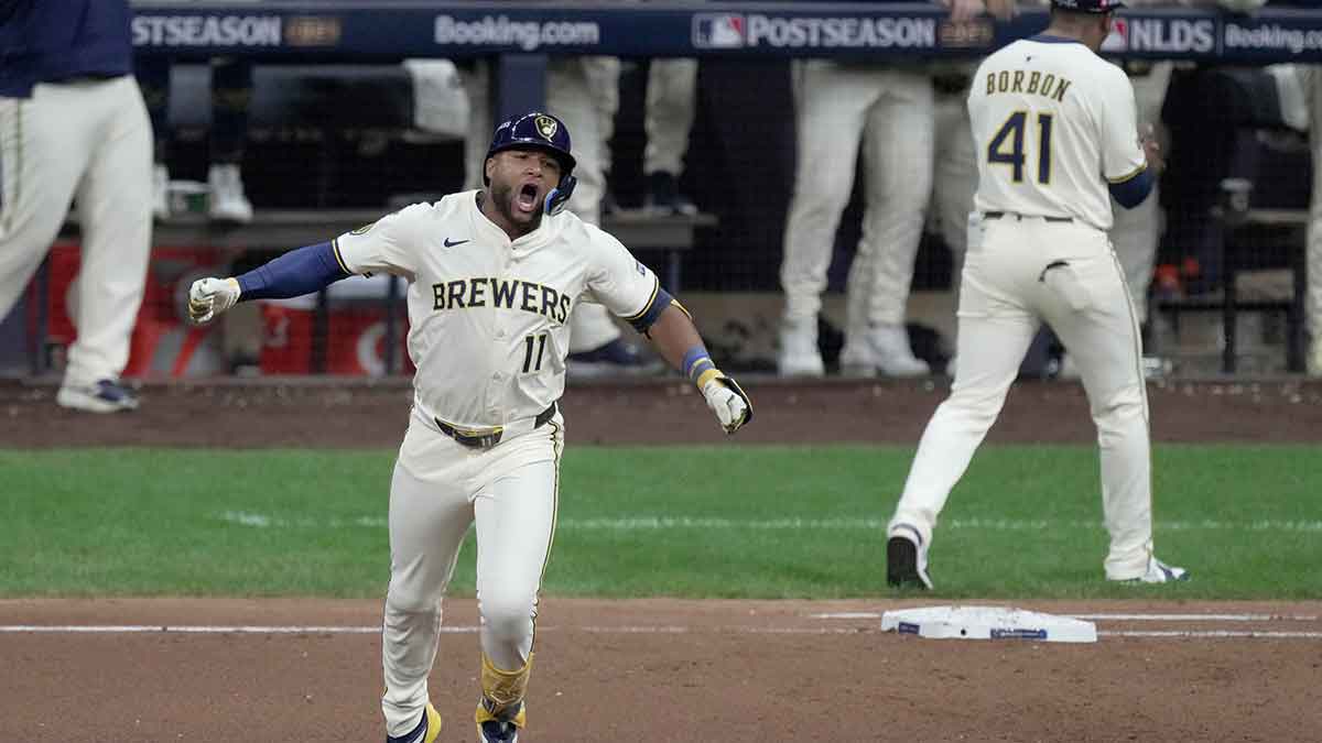 Milwaukee Brewers center fielder Jackson Chourio (11) hits a three-run home run off Chicago Cubs pitcher Daniel Palencia during the fourth inning of their National League Division Series game Monday, October 6, 2025 at American Family Field in Milwaukee, Wisconsin.