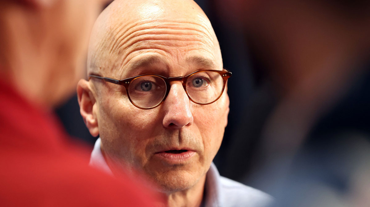 New York Yankees general manager Brian Cashman talks with the media before the game between the Yankees and the Washington Nationals at Yankee Stadium.