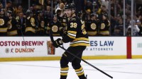Boston Bruins center Morgan Geekie (39) smiles at teammates after scoring against the Tampa Bay Lightning during the second period at TD Garden