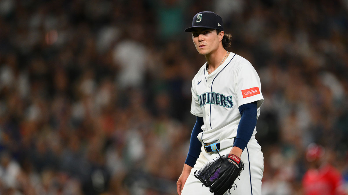 Seattle Mariners starting pitcher Bryan Woo (22) walks off the field after the final out against the Los Angeles Angels during the sixth inning at T-Mobile Park.