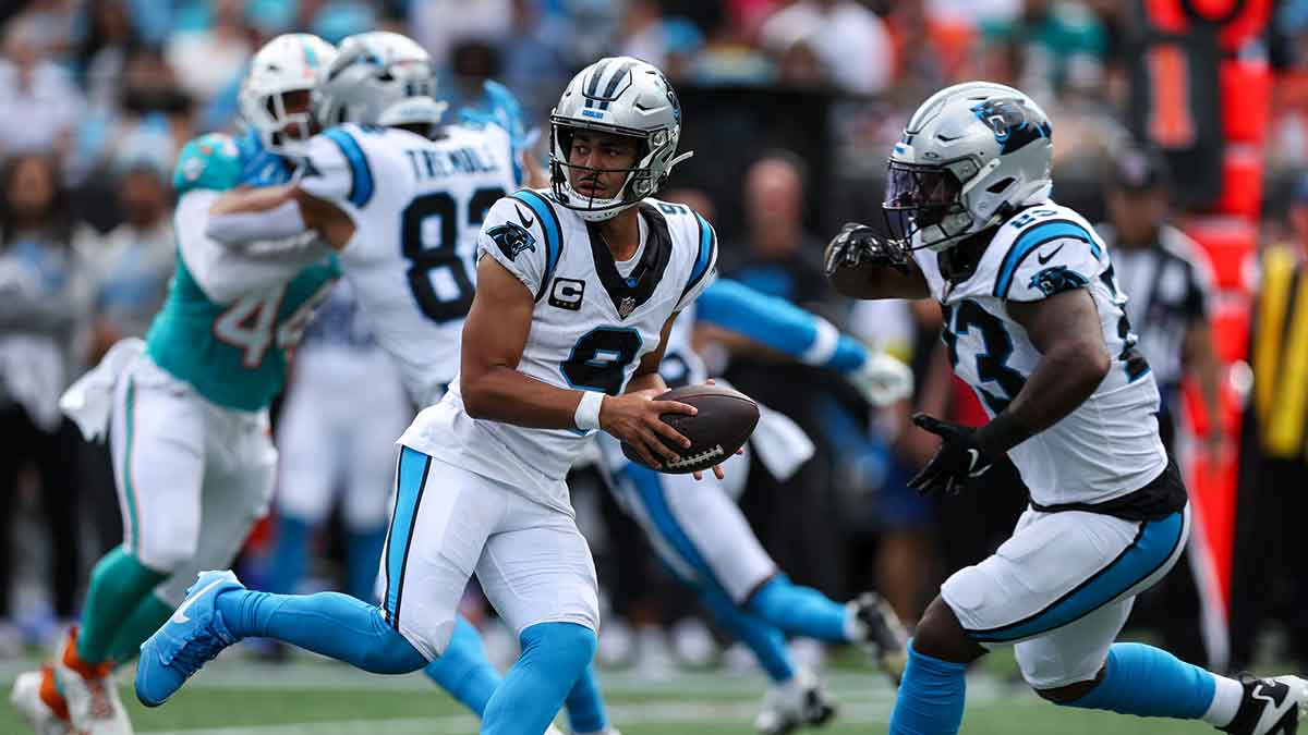 Carolina Panthers quarterback Bryce Young (9) fakes a hand off during the fourth quarter against the Miami Dolphins at Bank of America Stadium.