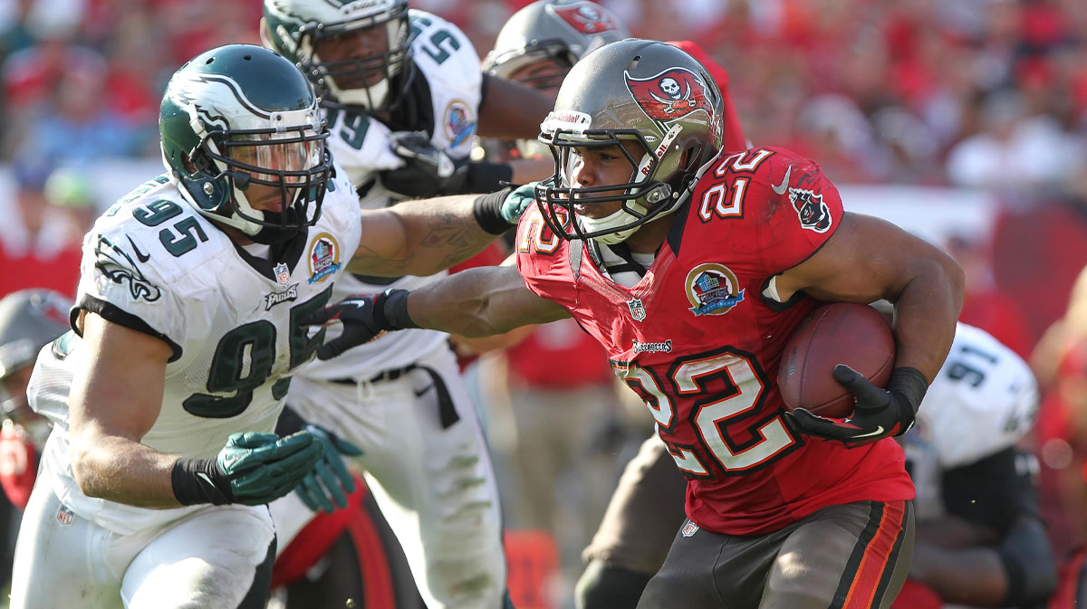Tampa Bay Buccaneers running back Doug Martin (22) stiff-arms Philadelphia Eagles outside linebacker Mychal Kendricks (95) during the second half at Raymond James Stadium. The Eagles won 23-21.