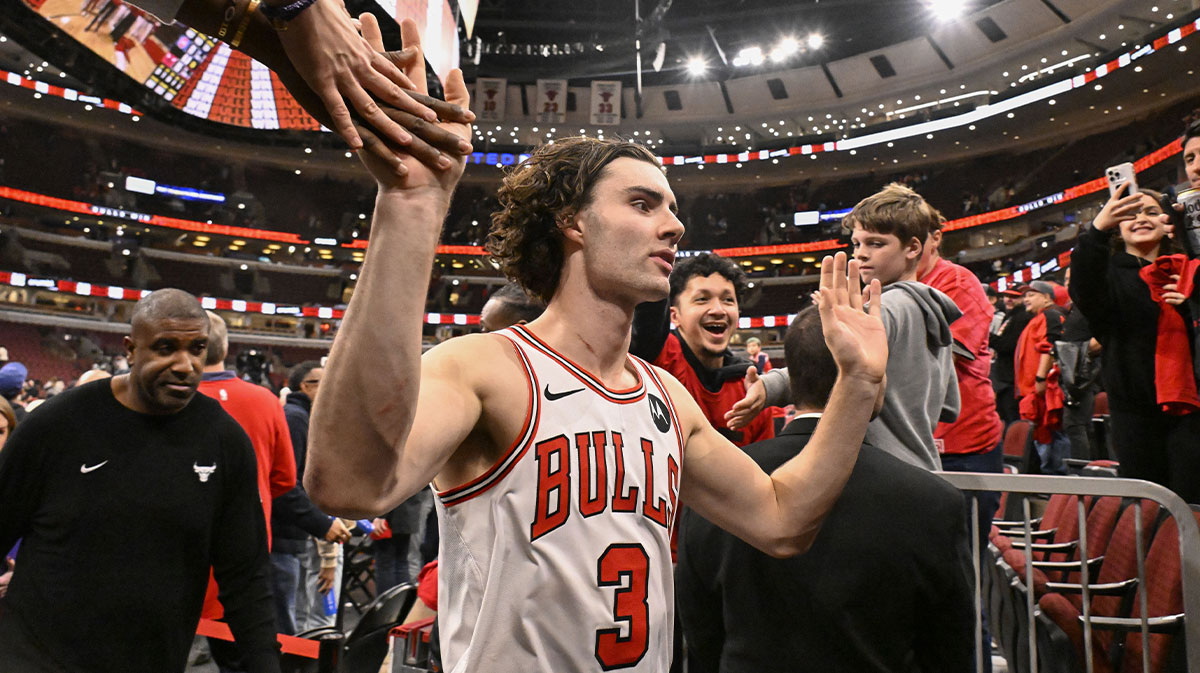 Chicago Bulls guard Josh Giddey (3) greets fans after the game against the Detroit Pistons at United Center.