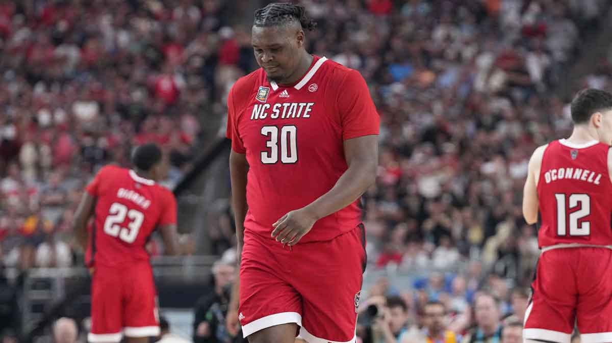 North Carolina State Wolfpack forward DJ Burns Jr. (30) walks back down court during the NCAA Men’s Basketball Tournament Final Four game against the Purdue Boilermakers, Saturday, April 6, 2024, at State Farm Stadium in Glendale, Ariz.