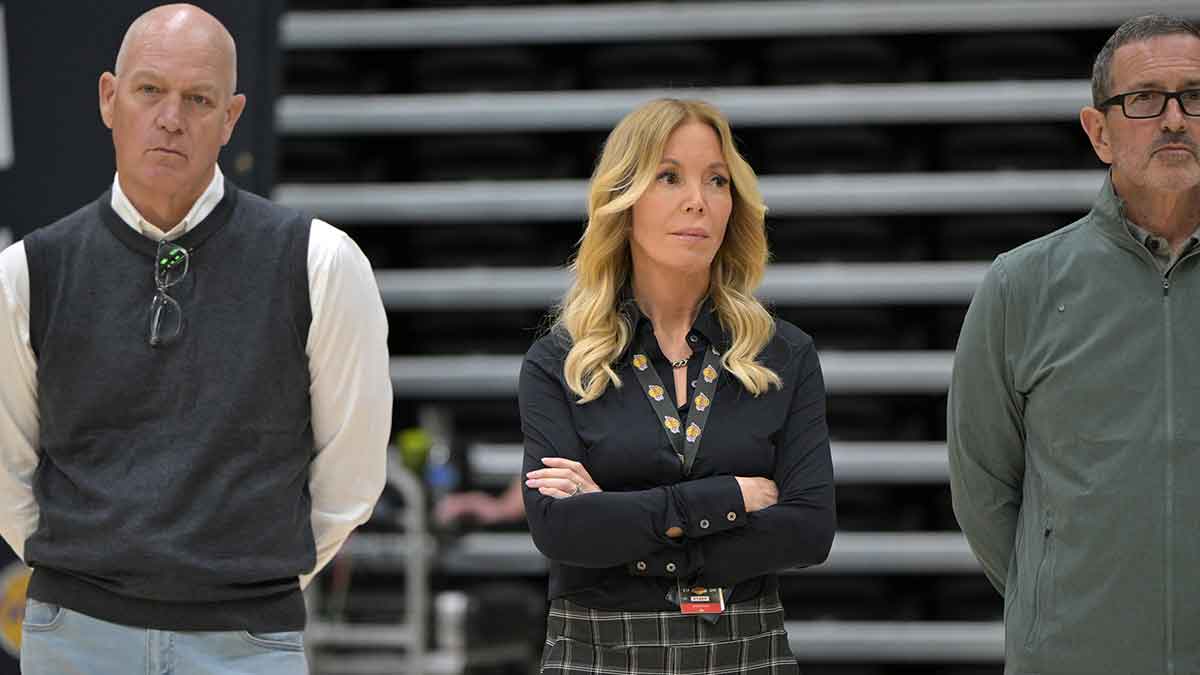 Jeannie Buss, controlling owner and president of the Los Angeles Lakers, stands with front office executives as they listen during the introductory news conference for new head coach JJ Redick at the UCLA Health Training Center