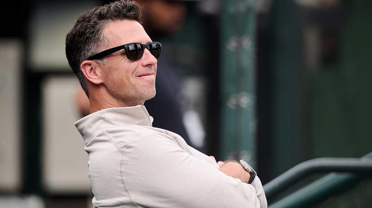 San Francisco Giants president of baseball operations Buster Posey sits in the dugout before the game against the Arizona Diamondbacks at Oracle Park.