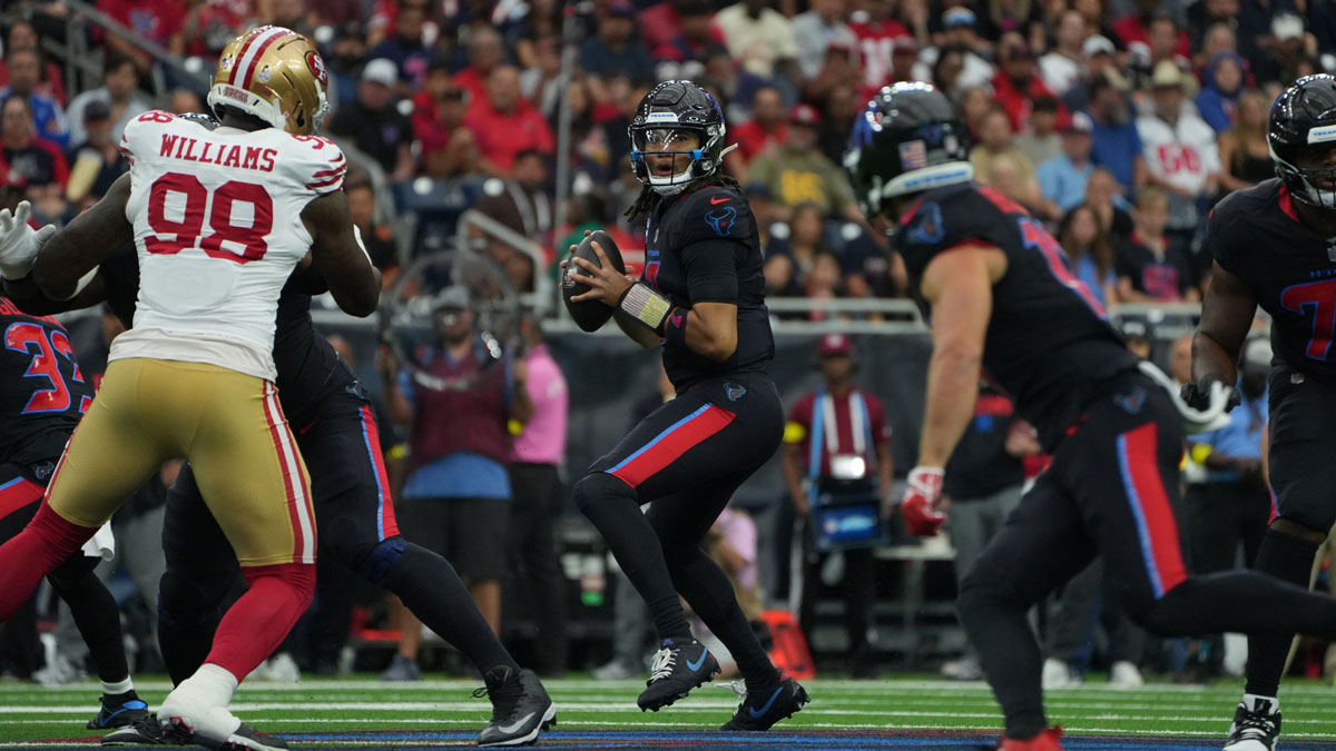 Houston Texans quarterback C.J. Stroud (7) looks to throw downfield during the first quarter against the San Francisco 49ers at NRG Stadium.