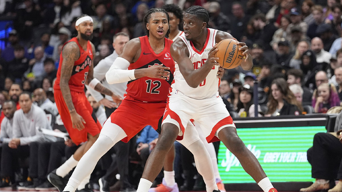 Houston Rockets center Clint Capela (30) controls the ball against Toronto Raptors forward Collin Murray-Boyles (12) during the first half at Scotiabank Arena.