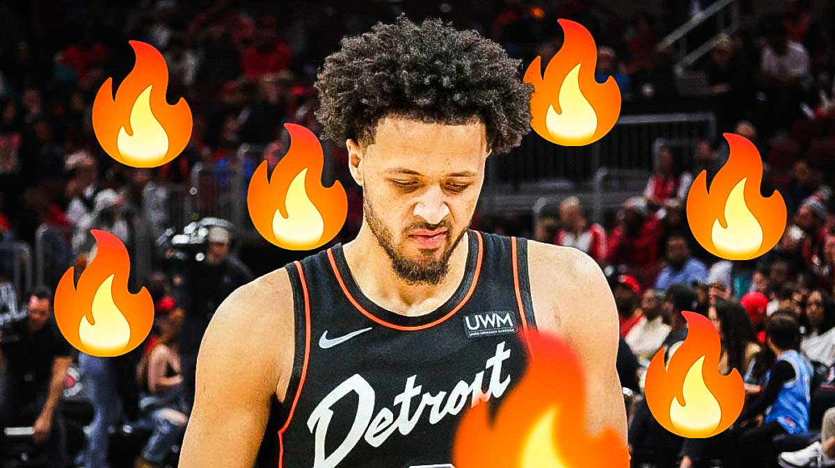 Cade Cunningham on the court with flame emojis around Detroit Pistons