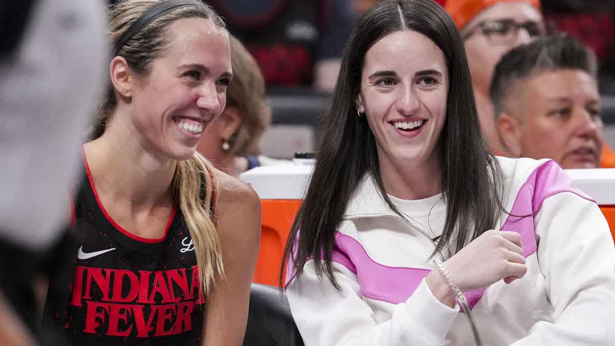 Indiana Fever guard Lexie Hull (10) and Indiana Fever guard Caitlin Clark (22) laugh from the bench during the game against the Minnesota Lynx at Gainbridge Fieldhouse.