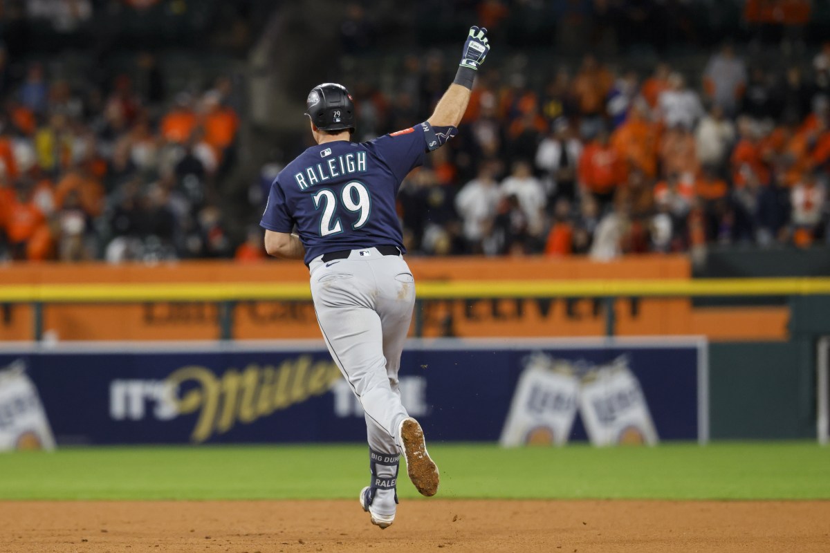 Seattle Mariners catcher Cal Raleigh (29) celebrates after hitting a two-run home run in the ninth inning against the Detroit Tigers during game three of the ALDS round for the 2025 MLB playoffs at Comerica Park.