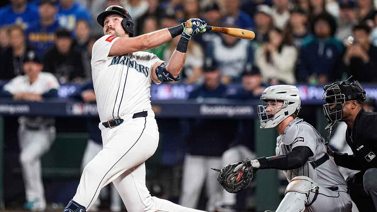 Mariners catcher Cal Raleigh hits a single against Tigers during the first inning of ALDS Game 5 at T-Mobile Park in Seattle on Friday, Oct. 10, 2025.