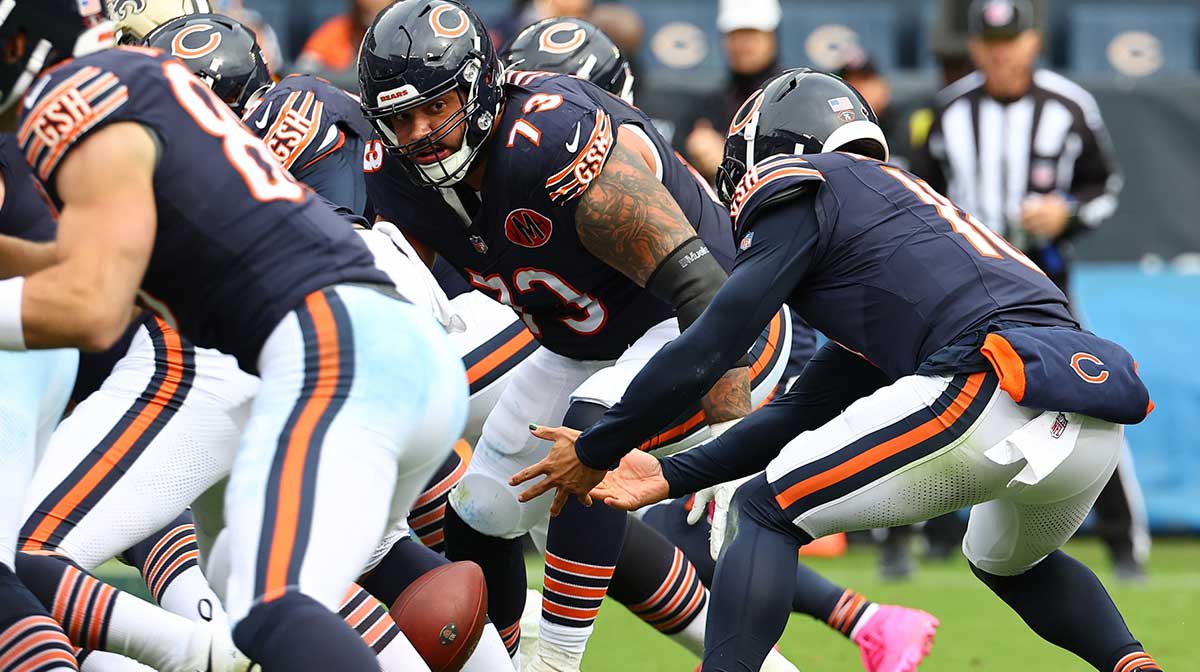 Chicago Bears quarterback Caleb Williams (18) fumbles the ball against the New Orleans Saints during the second half at Soldier Field.