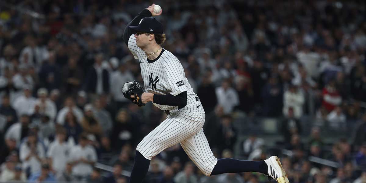 New York Yankees pitcher Cam Schlittler (31) throws to the plate in the first inning against the Boston Red Sox during game three of the Wildcard round for the 2025 MLB playoffs at Yankee Stadium. 