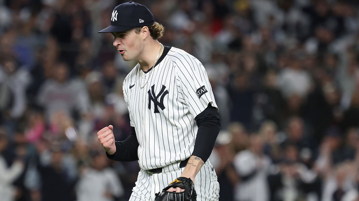 New York Yankees pitcher Cam Schlittler (31) pumps his fist as he leaves the field after pitching the eighth inning against the Boston Red Sox during game three of the Wildcard round for the 2025 MLB playoffs at Yankee Stadium.