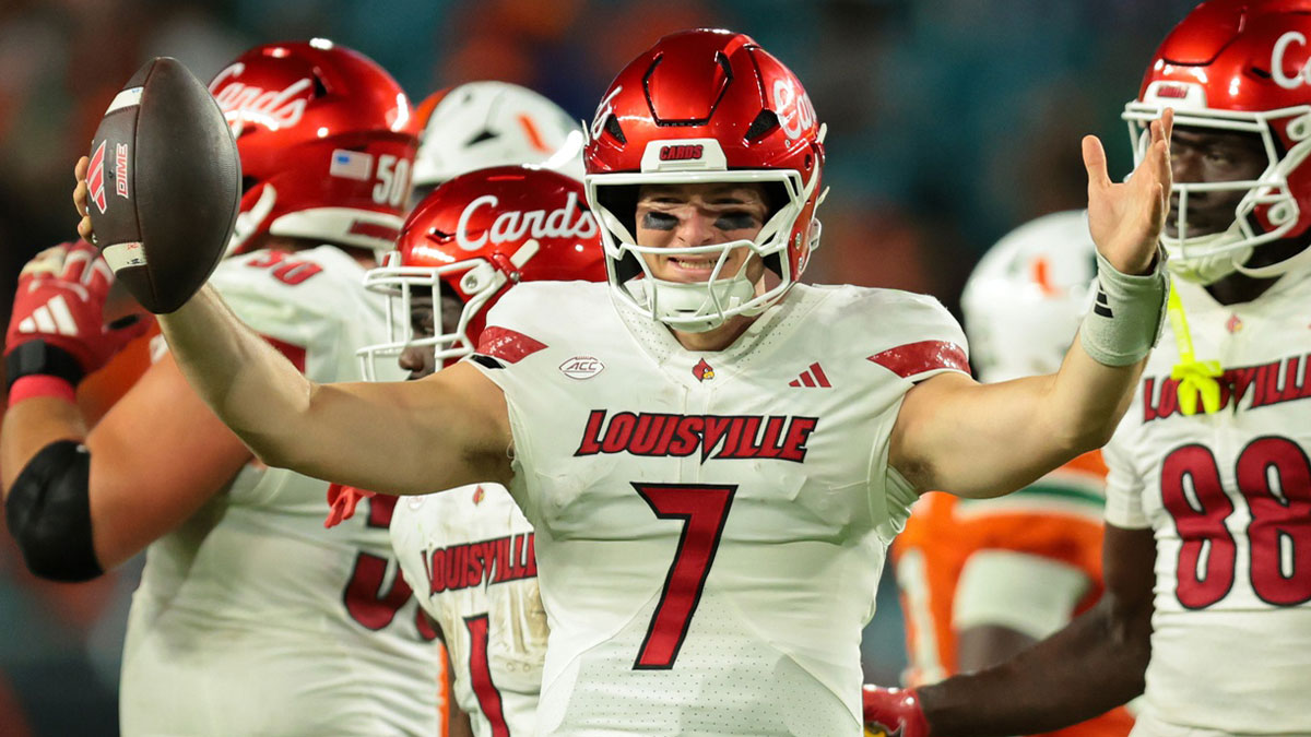 Louisville Cardinals quarterback Miller Moss (7) celebrates after winning the game against the Miami Hurricanes at Hard Rock Stadium.