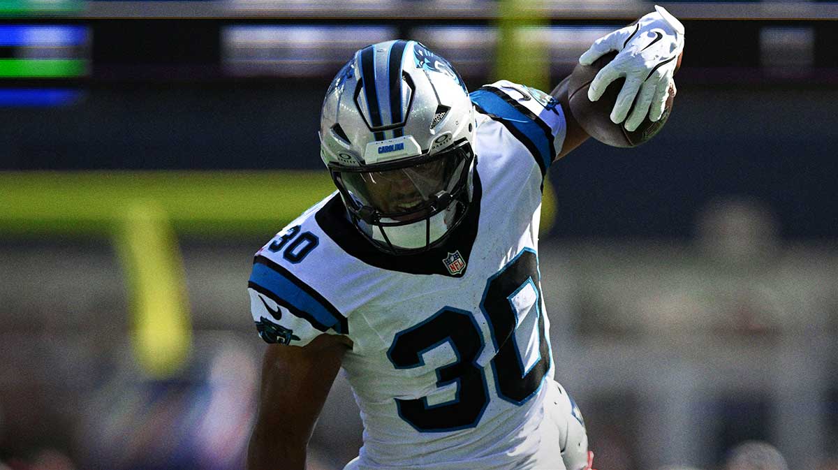 Carolina Panthers running back Chuba Hubbard (30) runs against the New England Patriots during the first half at Gillette Stadium.