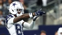 Dallas Cowboys wide receiver Ceedee Lamb (88) celebrates after a play against the Washington Commanders during the first quarter of the game at AT&T Stadium.