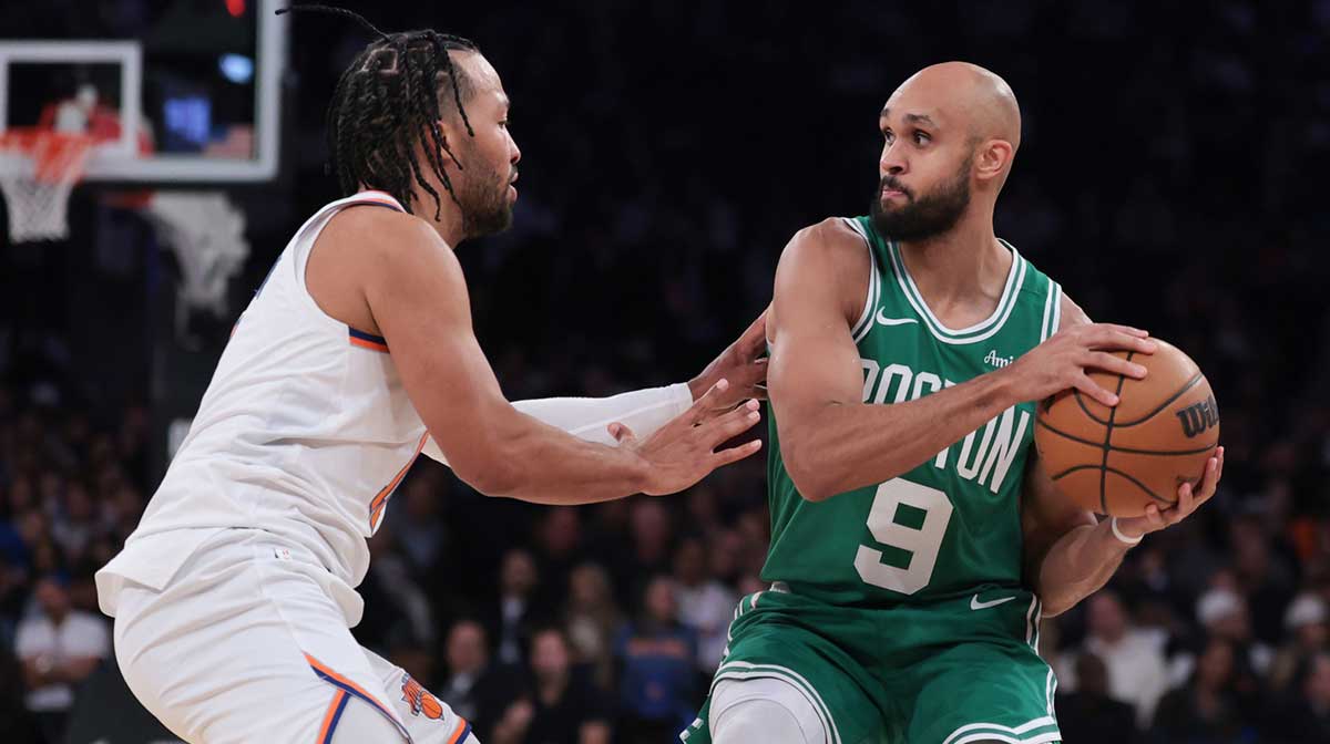 Boston Celtics guard Derrick White (9) is guarded by New York Knicks guard Jalen Brunson (11) during the fourth quarter at Madison Square Garden.