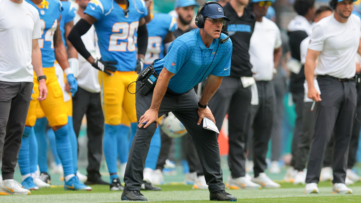 Los Angeles Chargers head coach Jim Harbaugh watches from the sideline against the Miami Dolphins during the first quarter at Hard Rock Stadium.