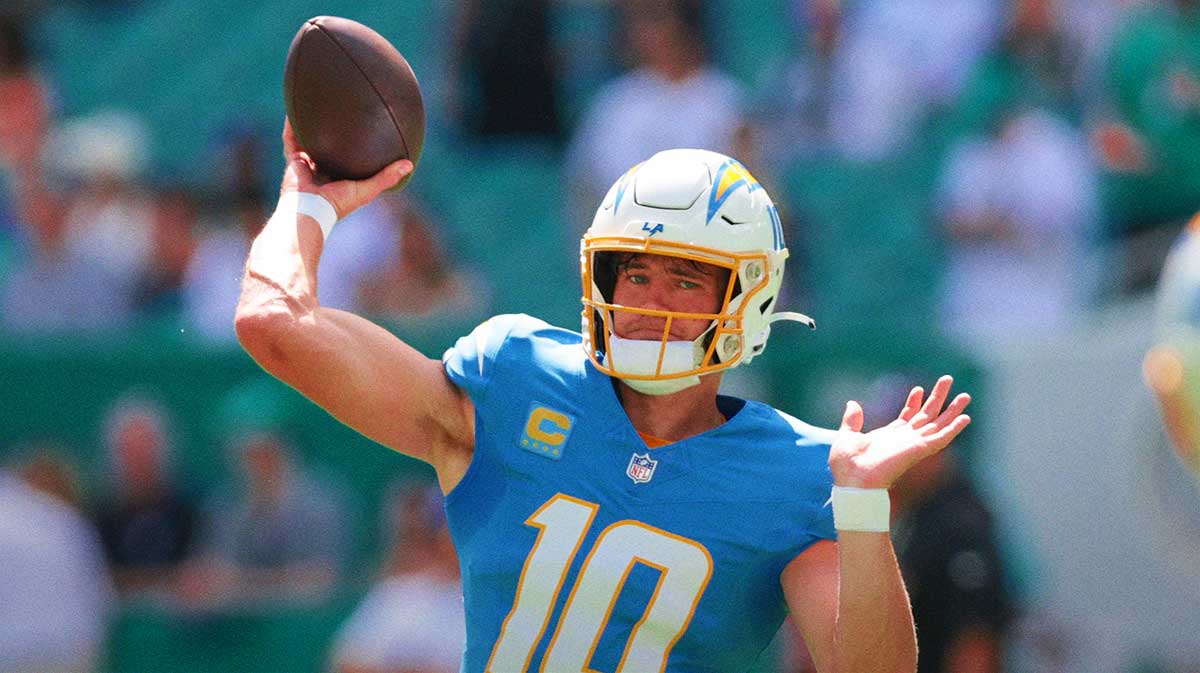Los Angeles Chargers quarterback Justin Herbert (10) throws the football before the game against the Miami Dolphins at Hard Rock Stadium.