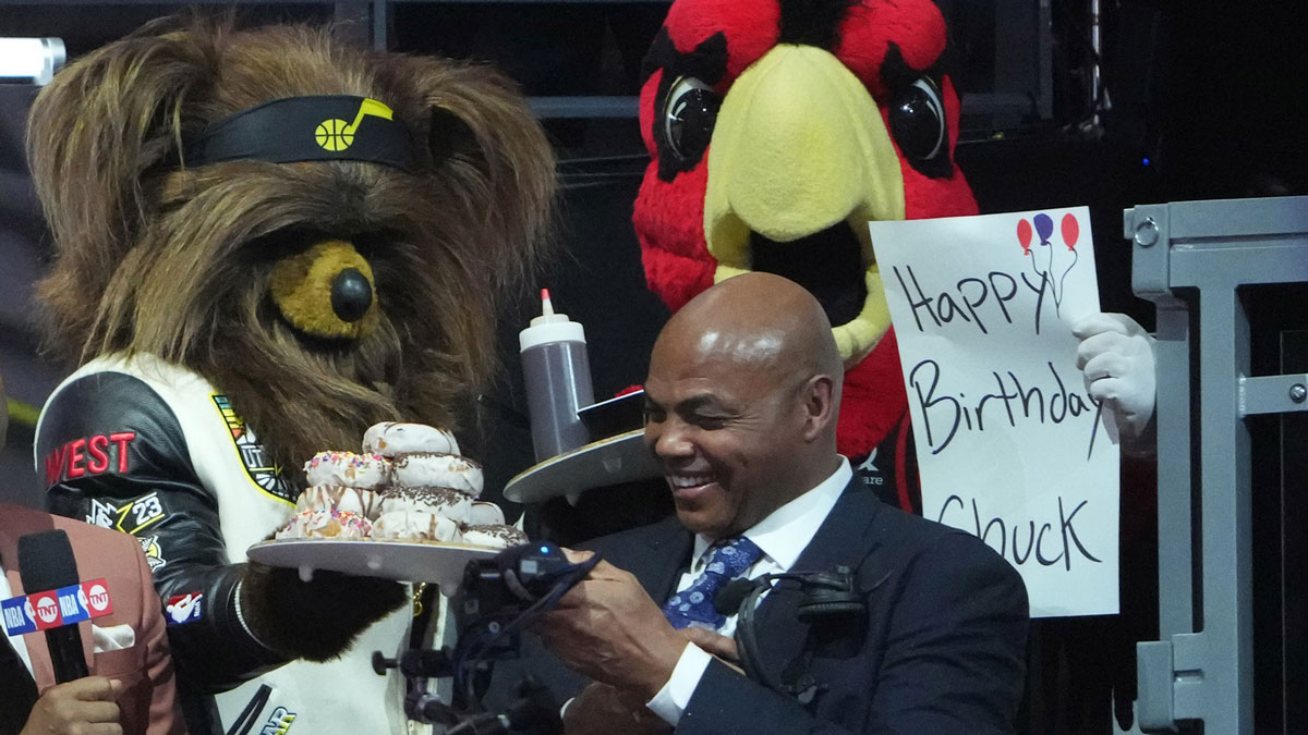 Charles Barkley is presented with a plate of doughnuts during the 2023 NBA All-Star Game at Vivint Arena.