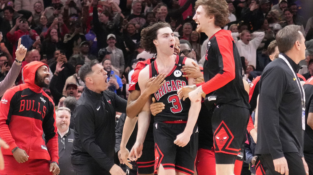 Chicago Bulls guard Josh Giddey (3) celebrates with teammates after making the game-winning three point basket against the Los Angeles Lakers during the second half at United Center.